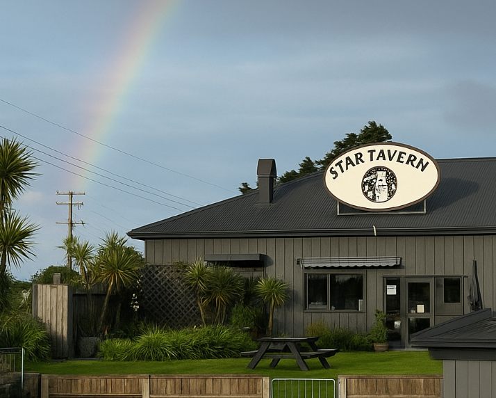 Star Tavern building with a rainbow in the sky